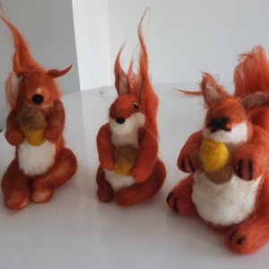 Great fun felting these red squirrels, holding their precious acorns..