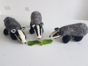 Felted badgers, black, white,