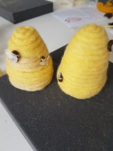 Yellow felted honey bees, bu