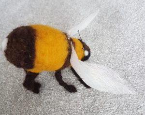 Felted stripey bees,