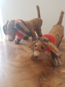Brown felted dog with a red bandan
