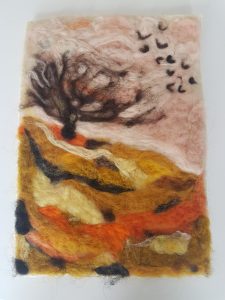 Needle felted picture of autumn scene with tree and birds
