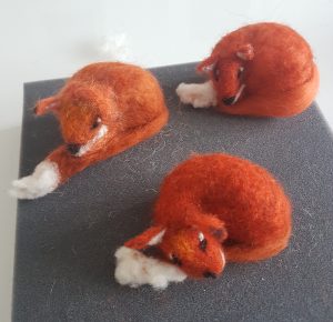 Red foxes needle felted