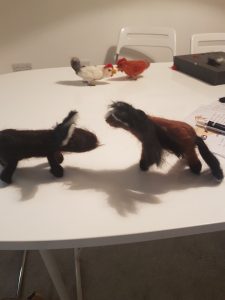 Brown felted ponies