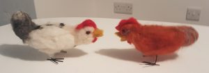 White felted chicken, red felted