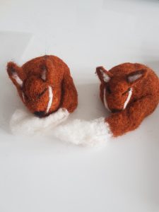 Red felted foxes