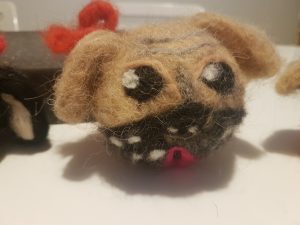 Felted pug dogs