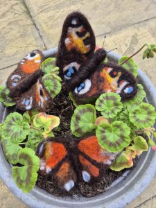Needle felted peacock butterflies,  wool felted insects. 