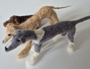 Needle felted dogs , dachsund and whippets,  dark brown and beige, wool , felted animals. 