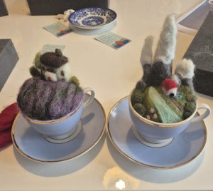 Learn how to needle felt scenes in a teacup workshops.
